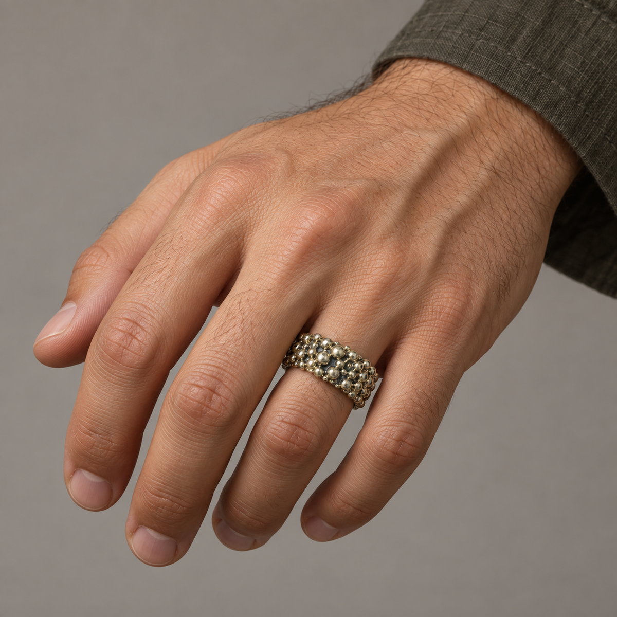 Model wearing the Lesunja Troja Ring Silver Blackened & Patinated