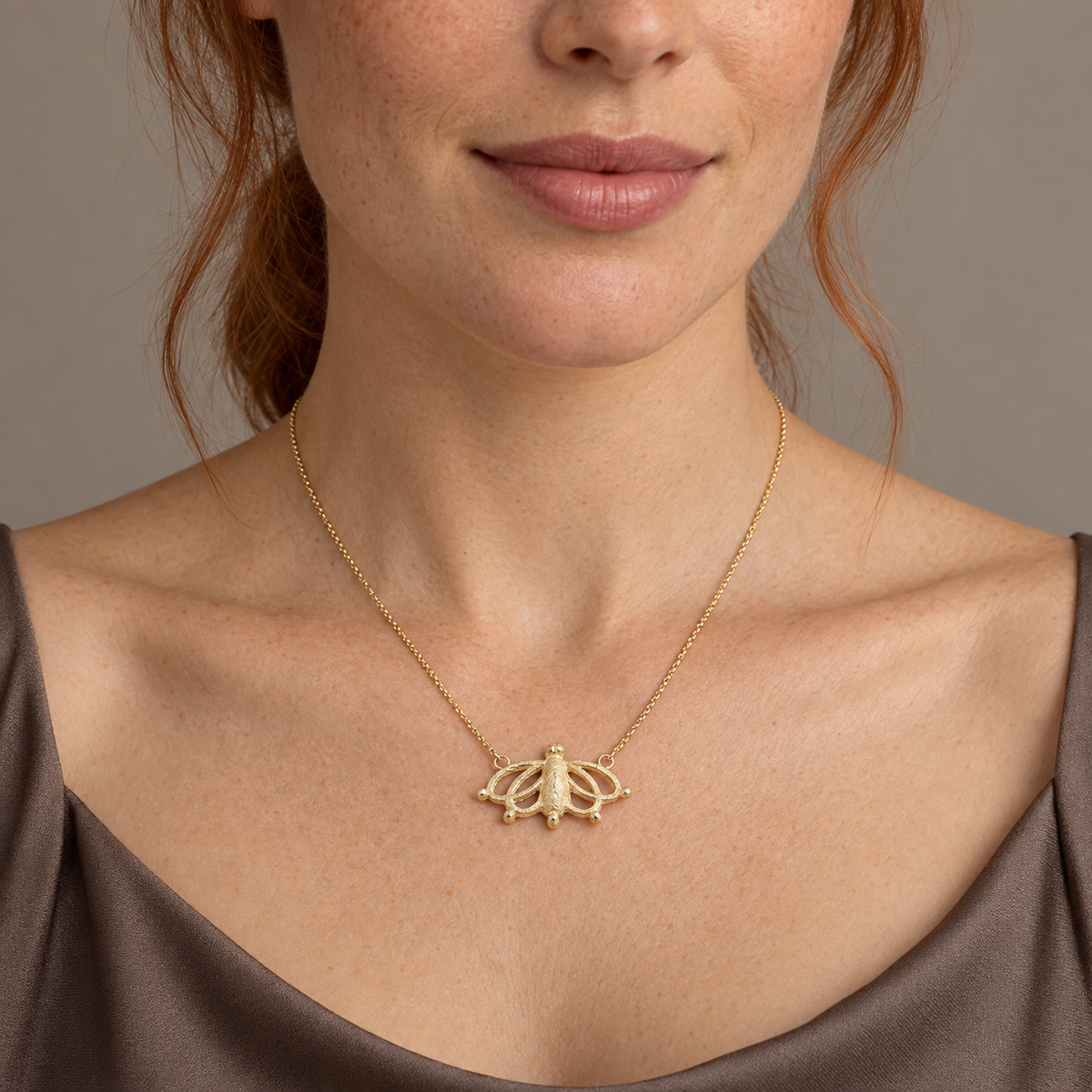Model wearing the Lesunja Sepia Biene Maya Silver Necklace
