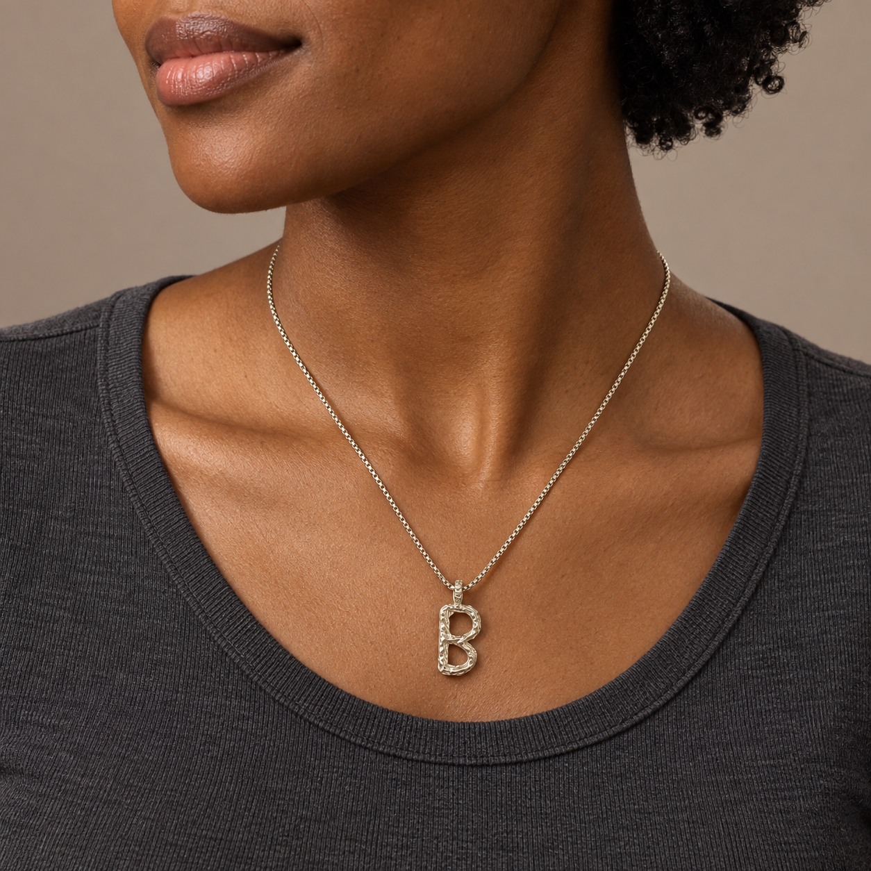 Model wearing the Lesunja Silver Letter B Necklace