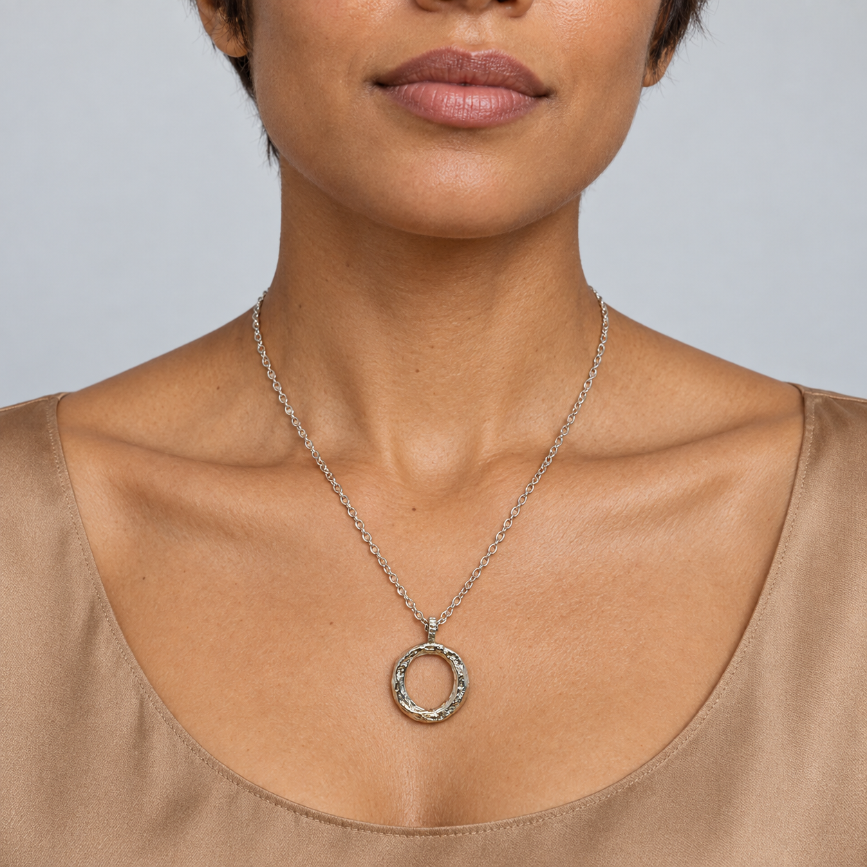 Model wearing the Lesunja Silver Letter O Necklace