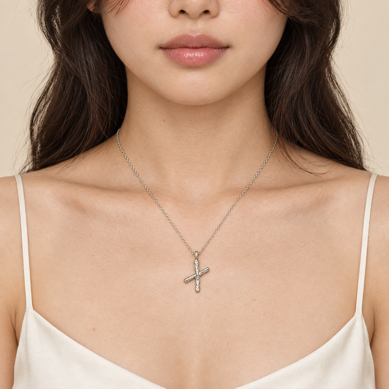 Model wearing the Lesunja Silver Letter X Necklace