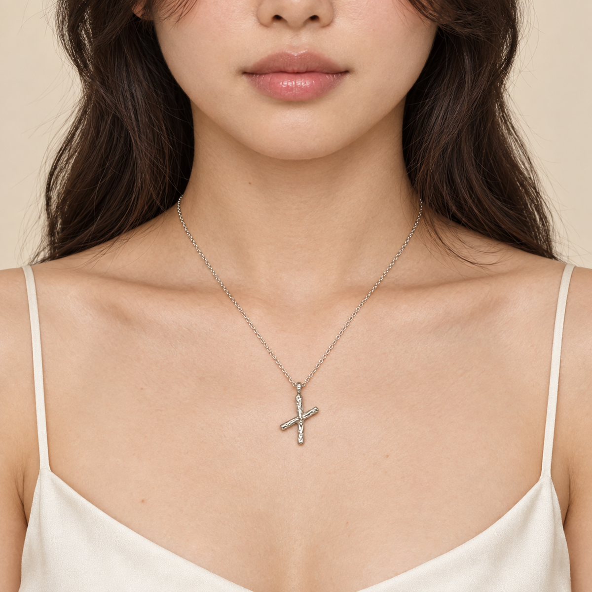 Model wearing the Lesunja Silver Letter X Necklace