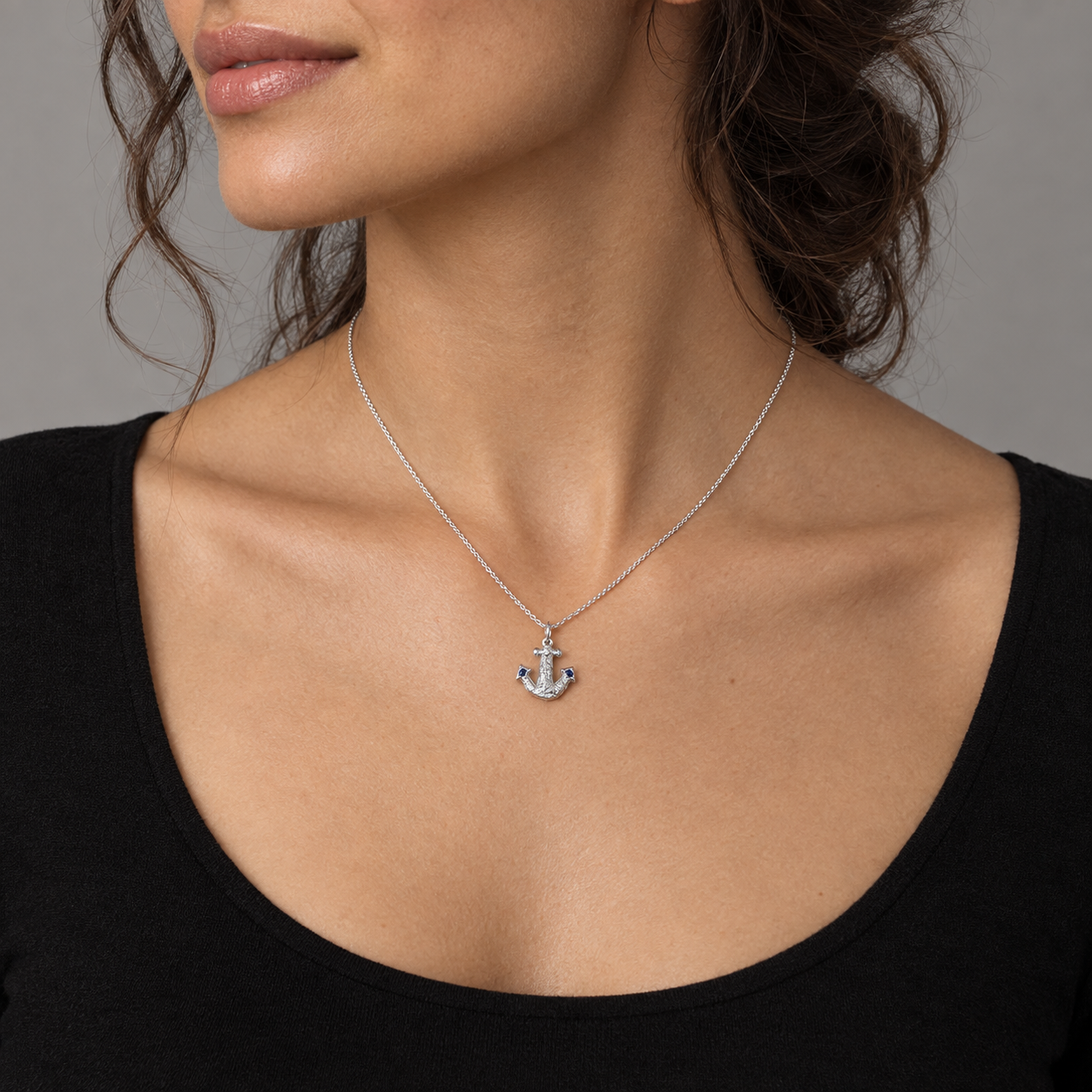 Model wearing the Lesunja Sepia Anchor Silver Pendant