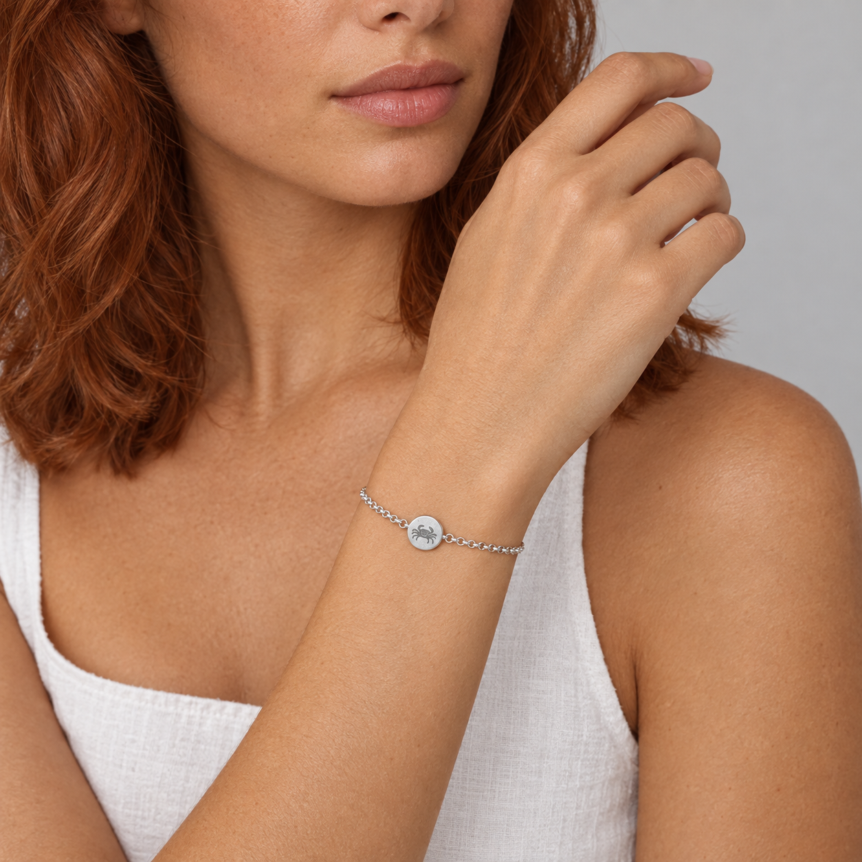 Model wearing the Lesunja Zodiac Cancer Silver Bracelet