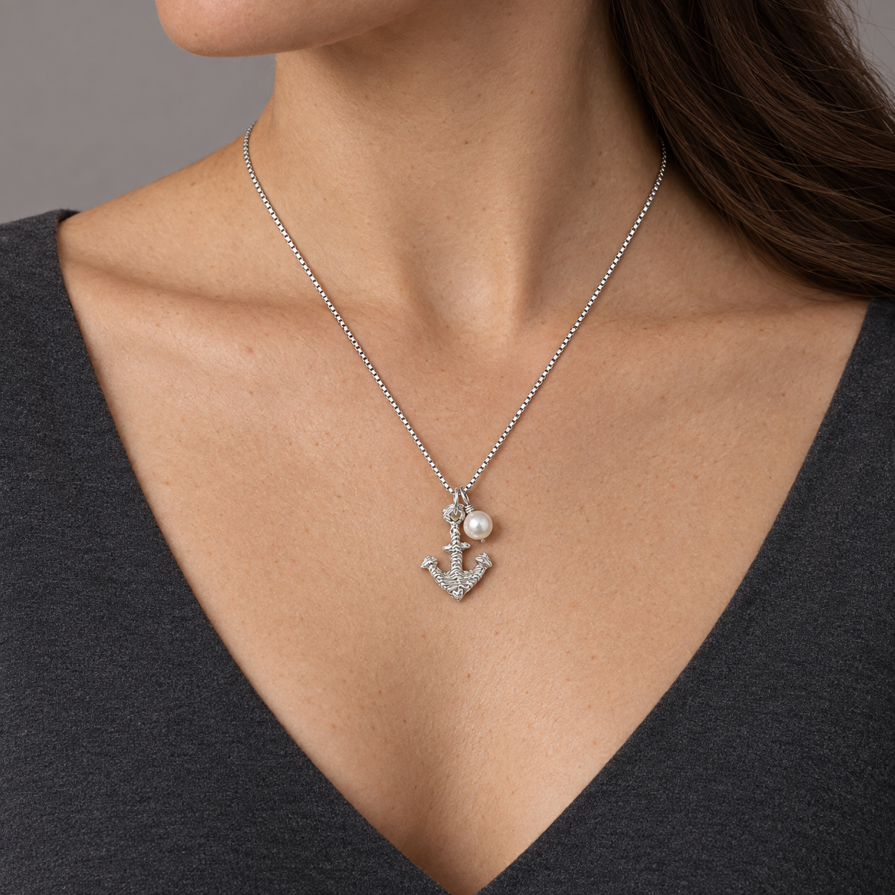 Model wearing the Lesunja Anchor Necklace Silver Sepia and Freshwater Pearl