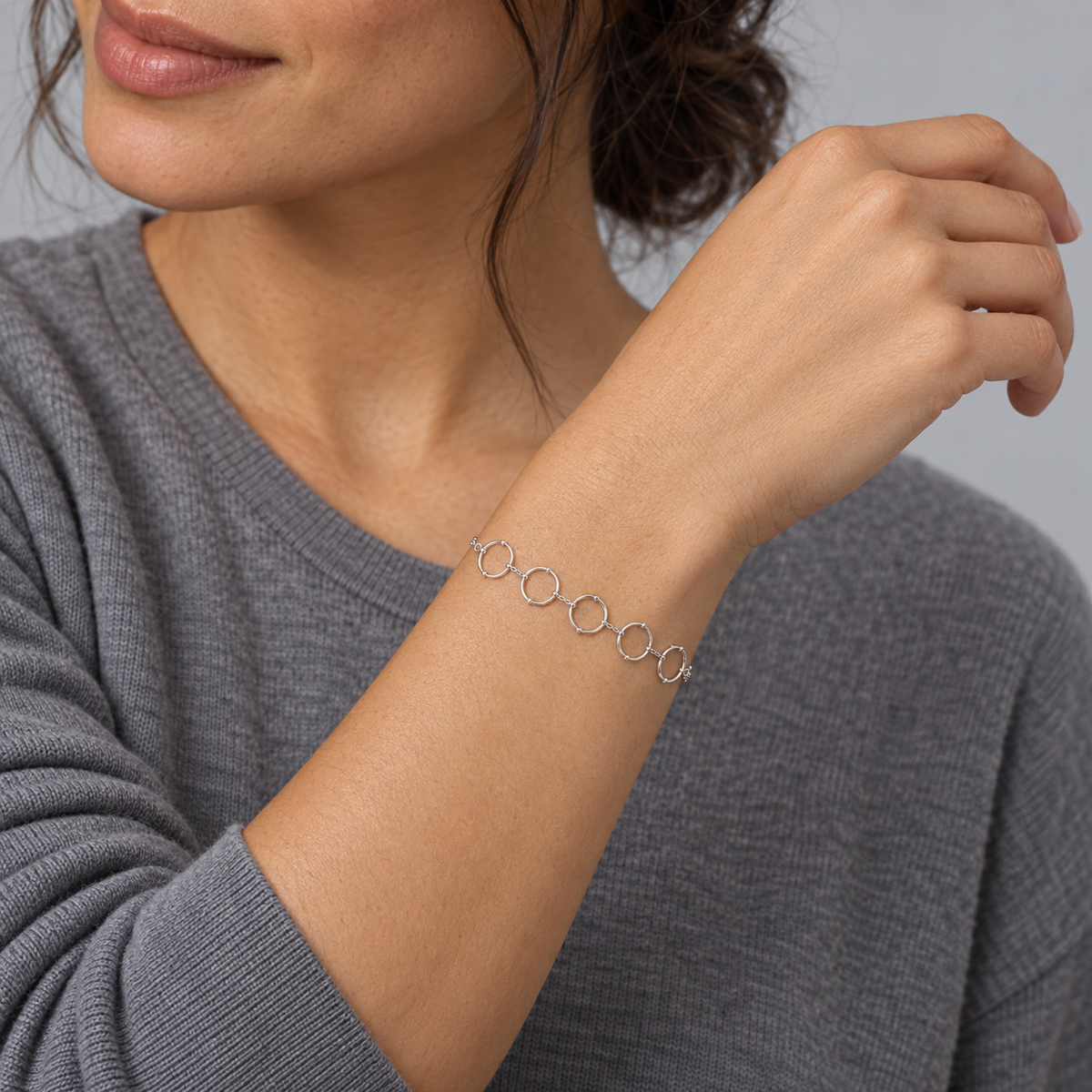 Model wearing the Lesunja Ocean Charm Silver Bracelet