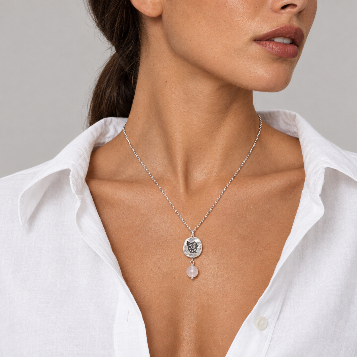Model wearing the Lesunja Zodiac Virgo Silver Necklace Rose Quartz
