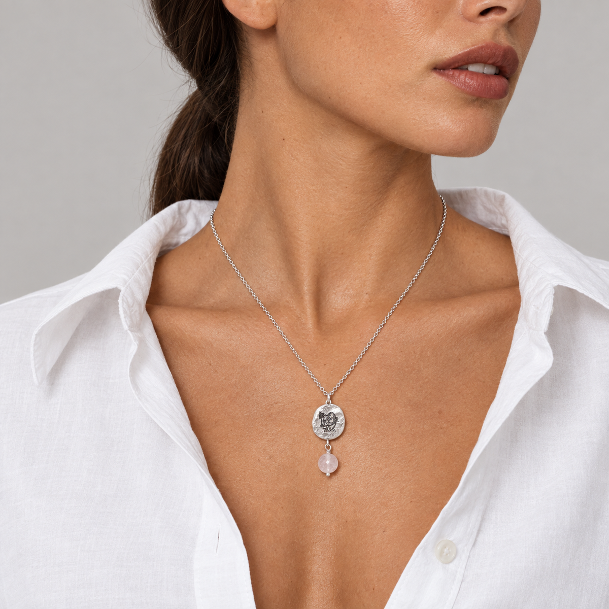 Model wearing the Lesunja Zodiac Virgo Silver Necklace Rose Quartz