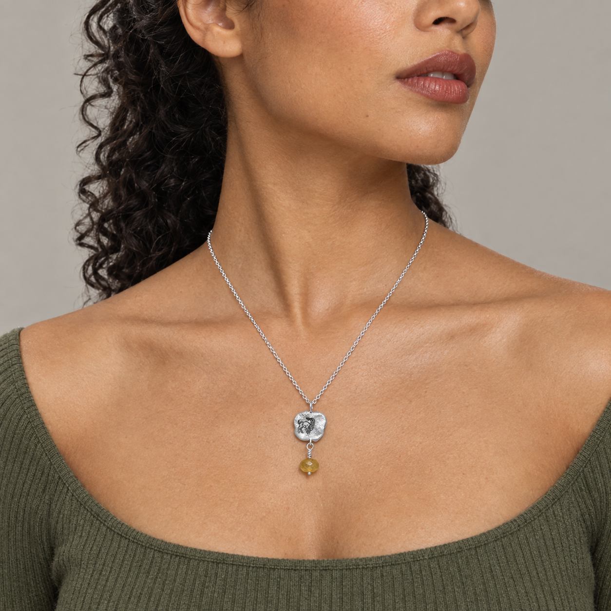 Model wearing the Lesunja Zodiac Capricorn Silver Necklace