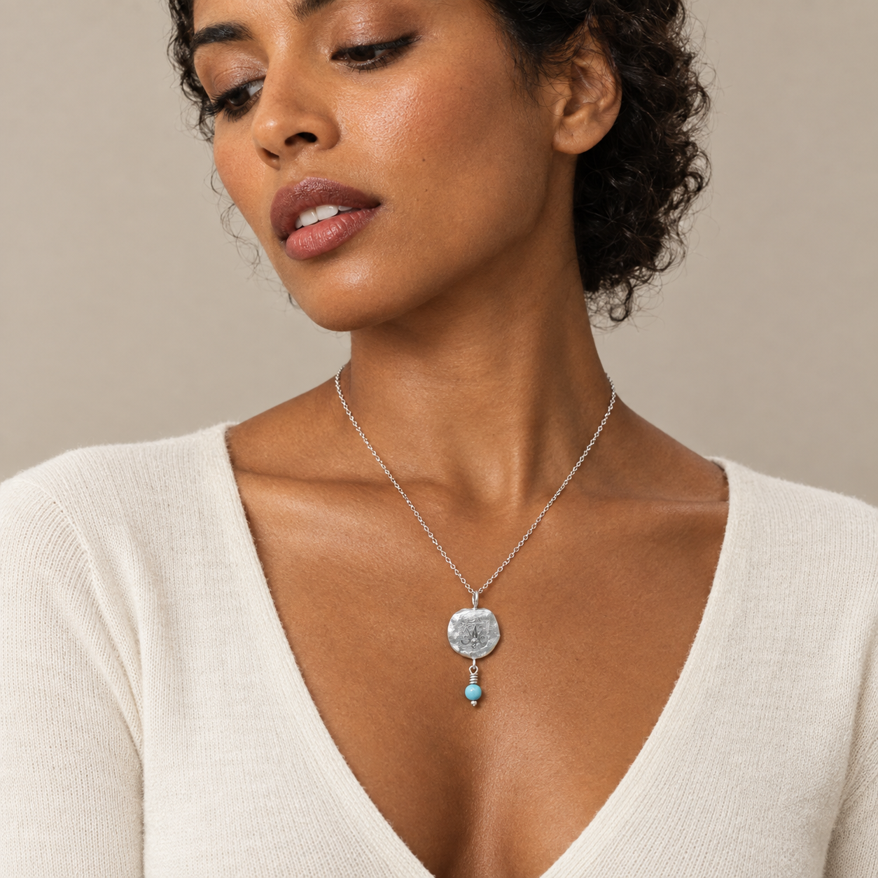 Model wearing the Lesunja Zodiac Libra Silver Necklace Turquoise