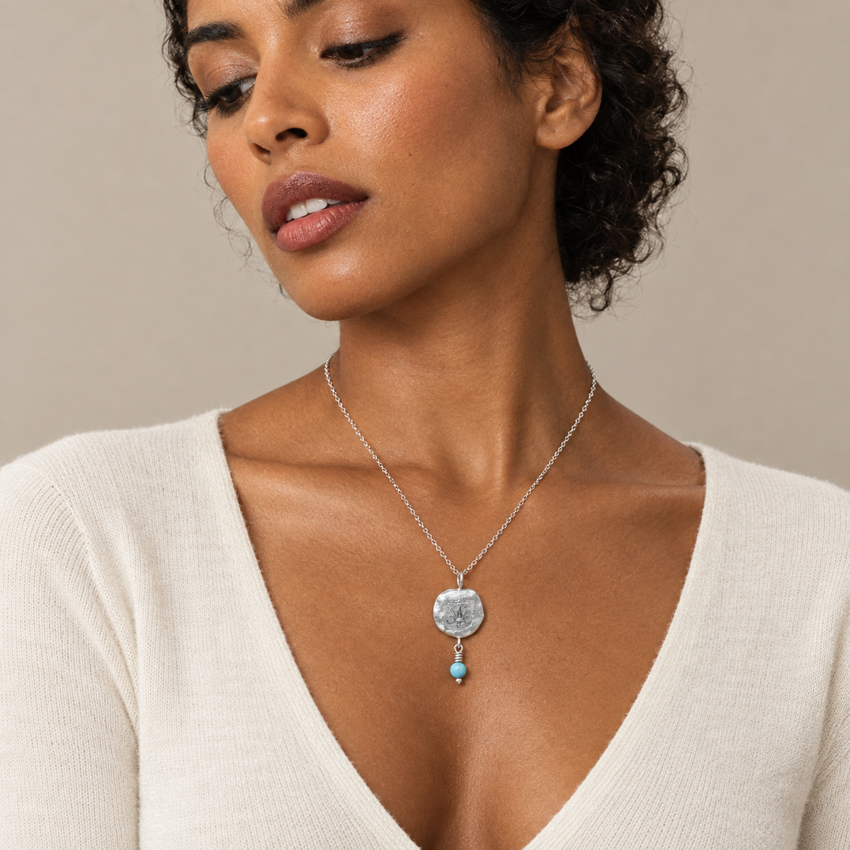 Model wearing the Lesunja Zodiac Libra Silver Necklace Turquoise