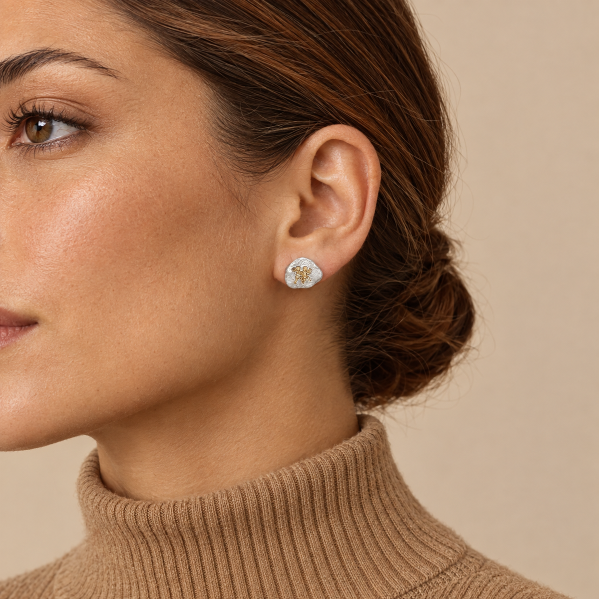 Model wearing the Lesunja Zodiac Gemini Silver Earrings