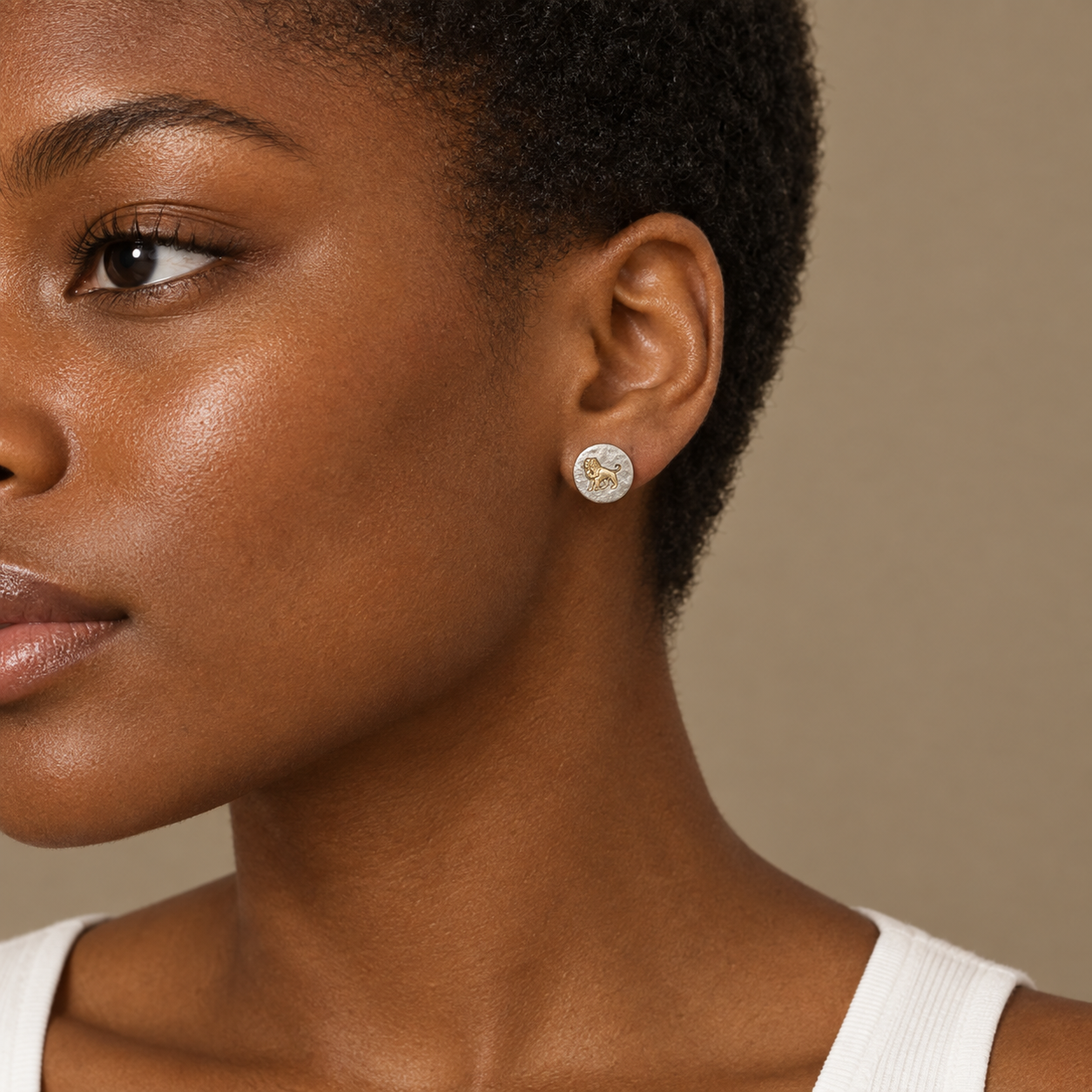 Model wearing the Lesunja Zodiac Leo Silver Earrings