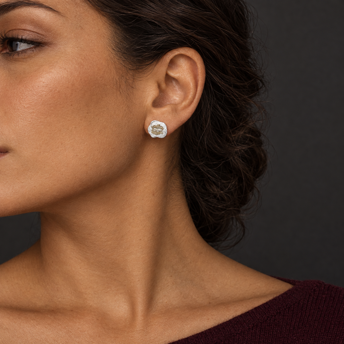 Model wearing the Lesunja Zodiac Pisces Silver Earrings