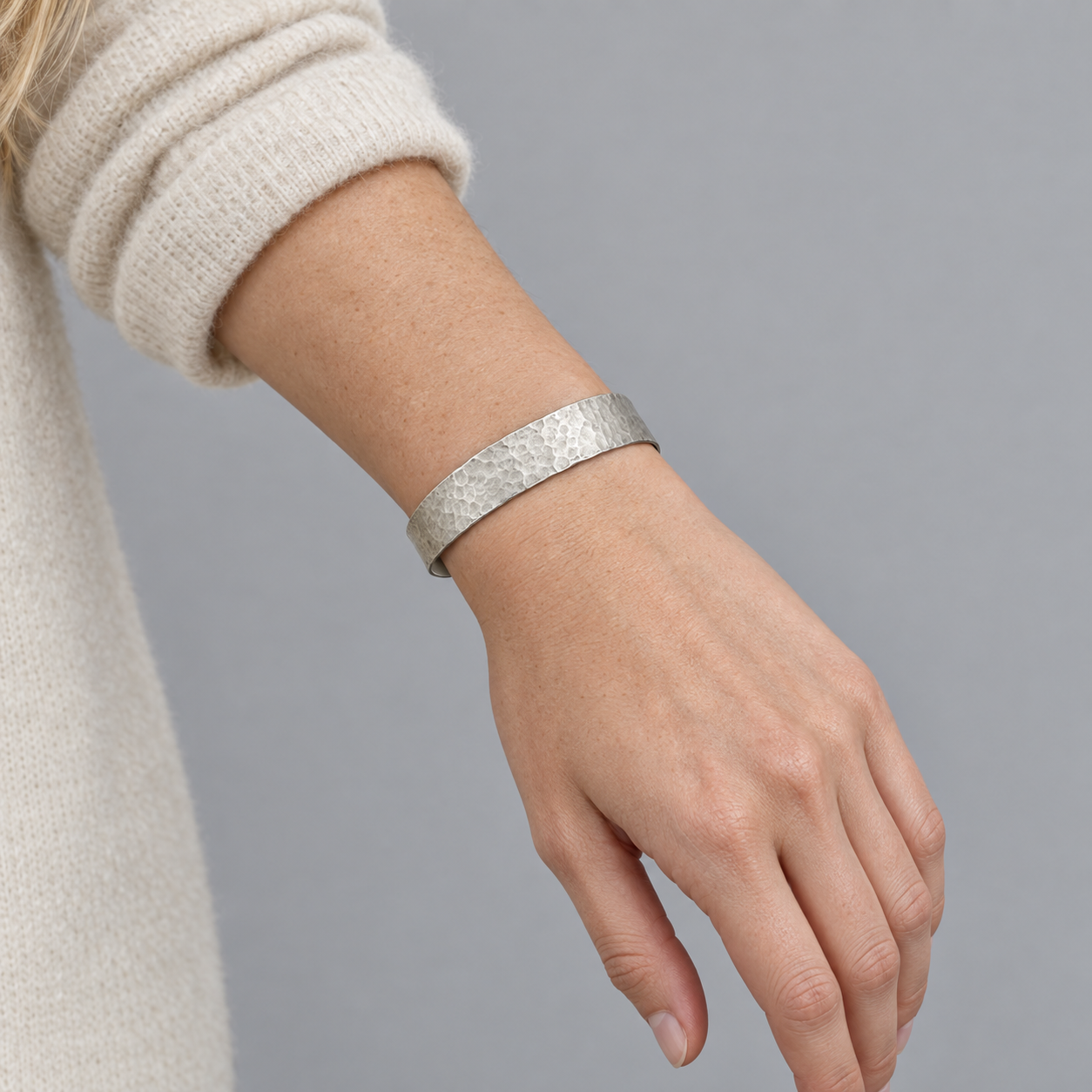 Model wearing the Lesunja Silver Bangle Hammered