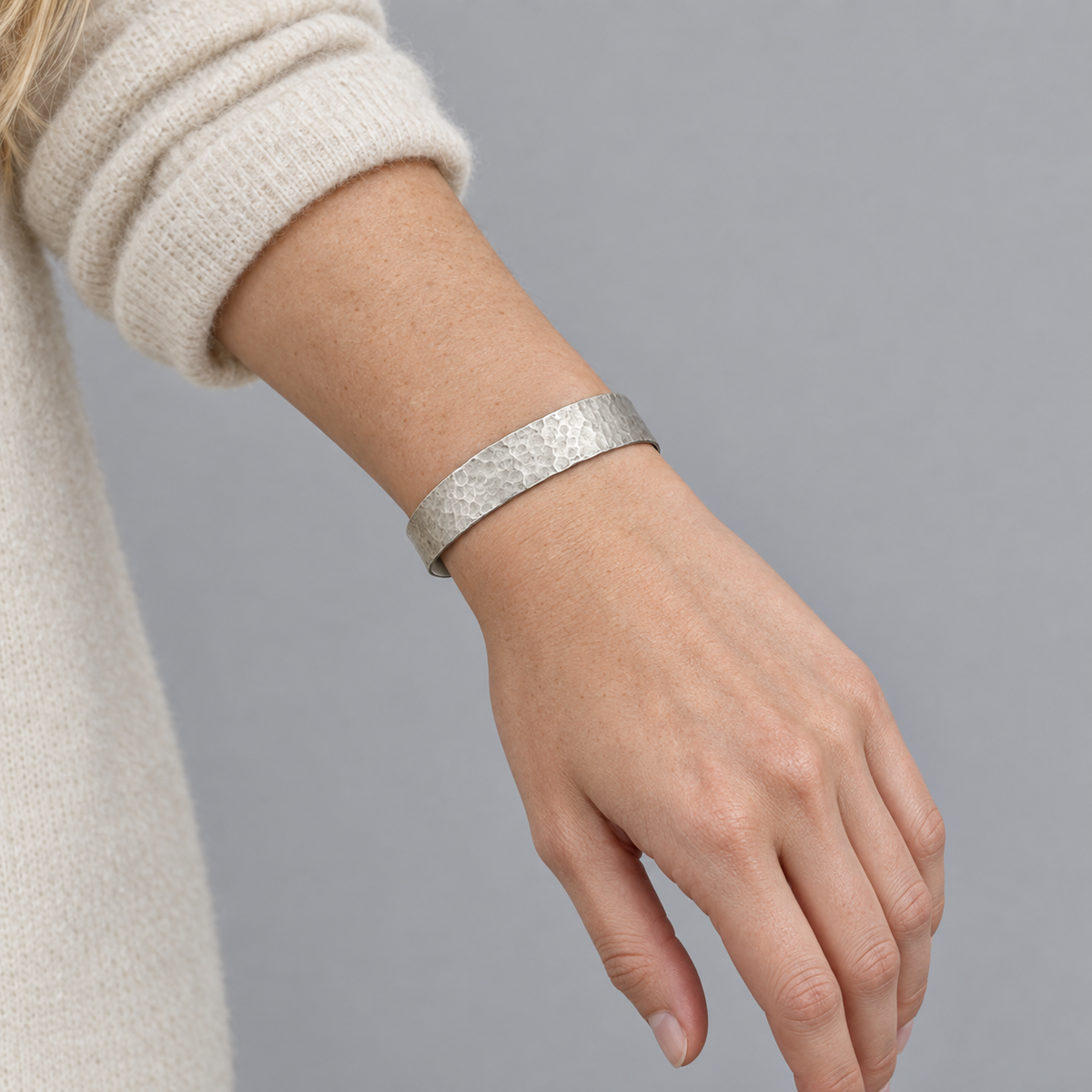 Model wearing the Lesunja Silver Bangle Hammered