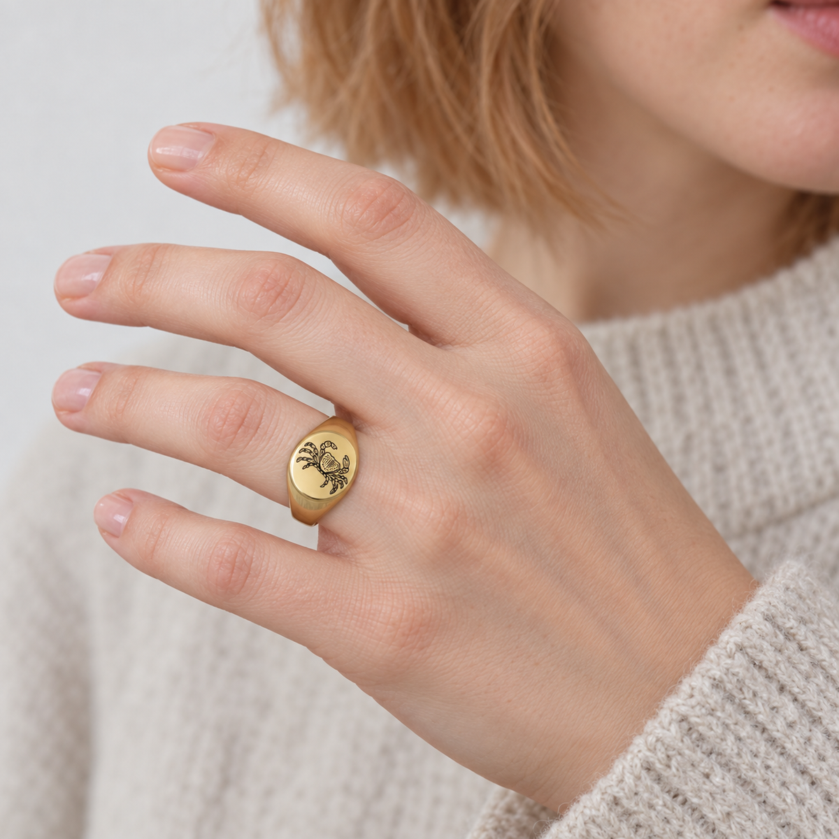 Model wearing the Lesunja Zodiac Cancer Steel Yellow Gold Plated Ring