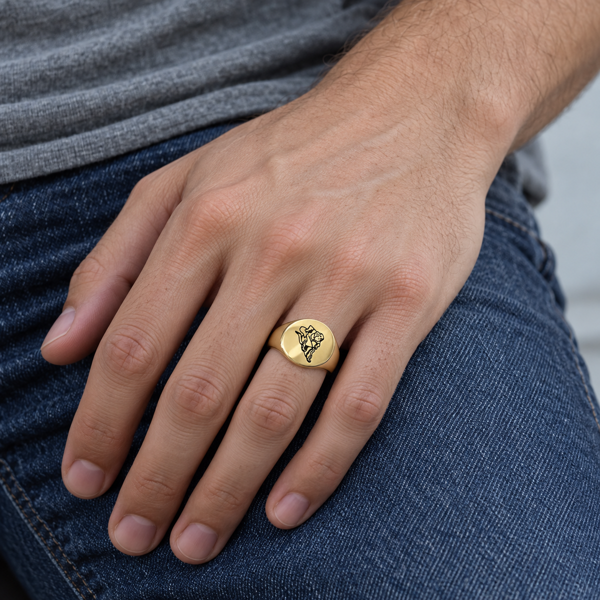Model wearing the Lesunja Zodiac Steel Aquarius Yellow Gold Plated Ring