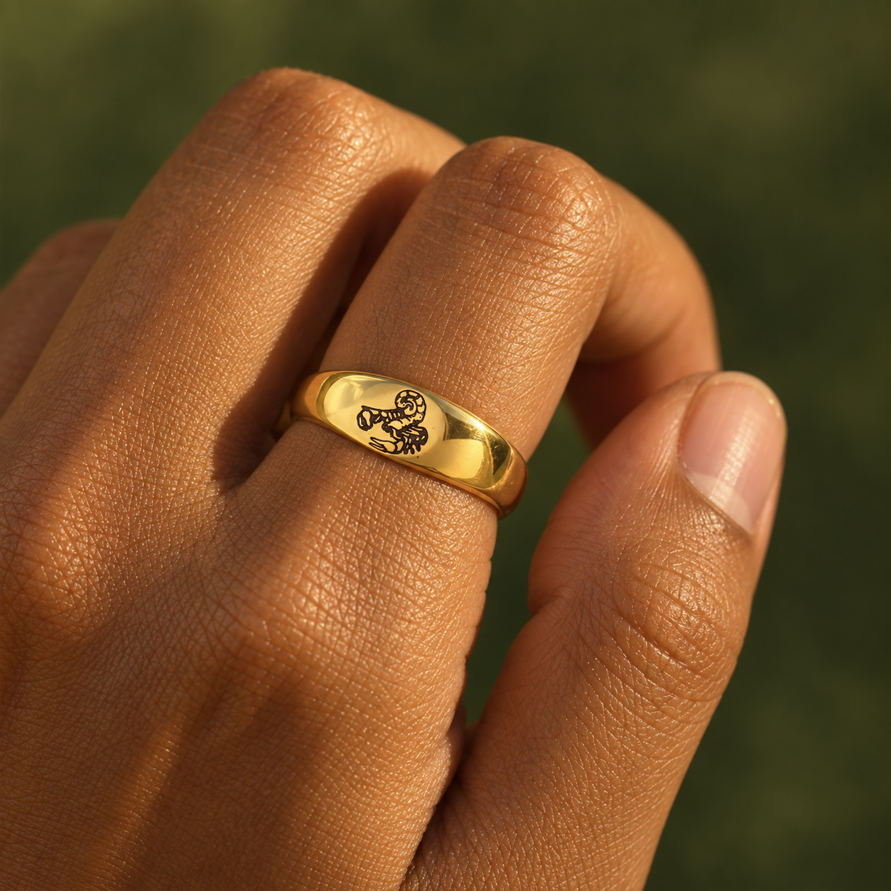 Model wearing the Lesunja Zodiac Steel Scorpio Yellow Gold Plated Ring