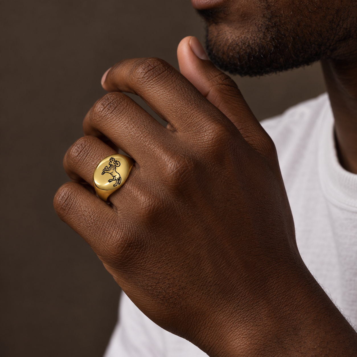 Model wearing the Lesunja Zodiac Aries Steel Yellow Gold Plated Ring