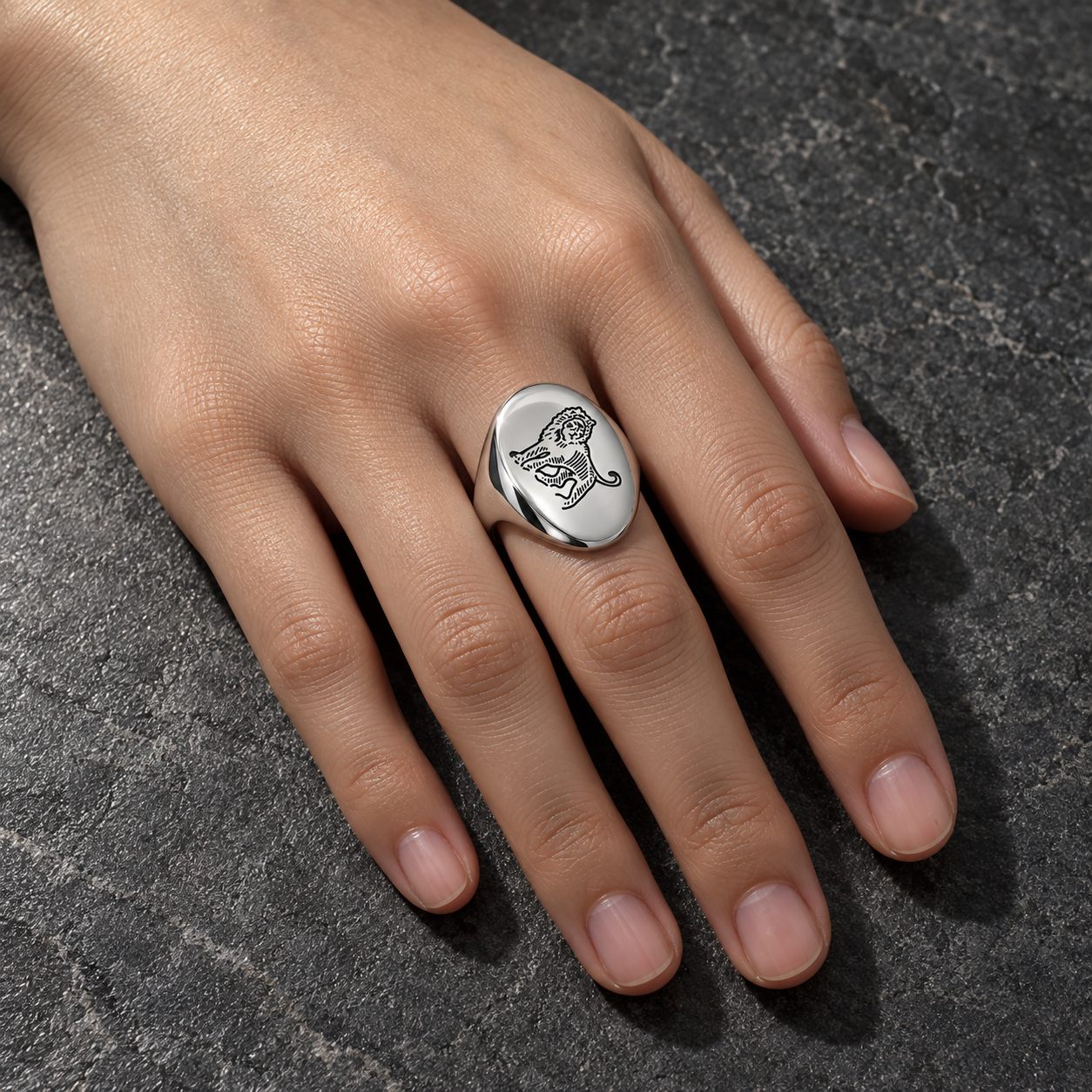 Model wearing the Lesunja Zodiac Leo Steel Ring
