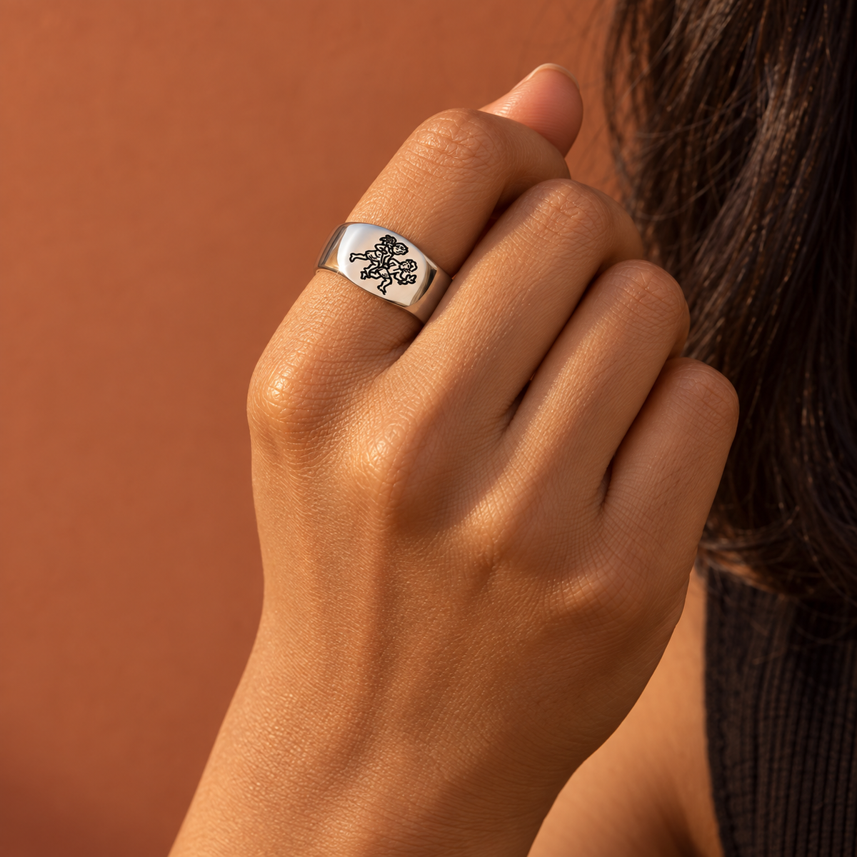 Model wearing the Lesunja Zodiac Gemini Steel Ring
