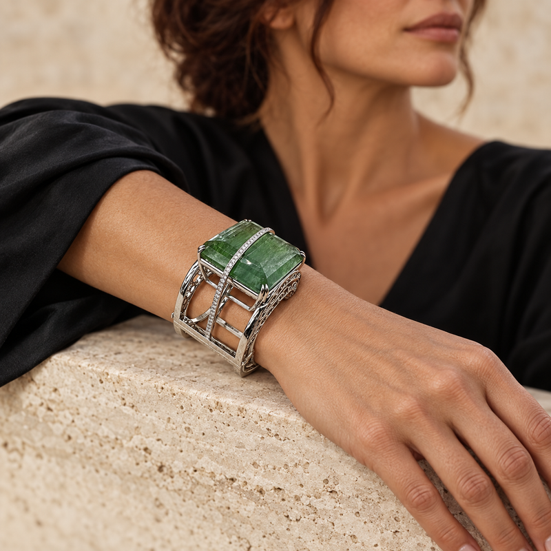 Model wearing the Lesunja Magnifique Bracelet White Gold Green Aquamarine Diamonds