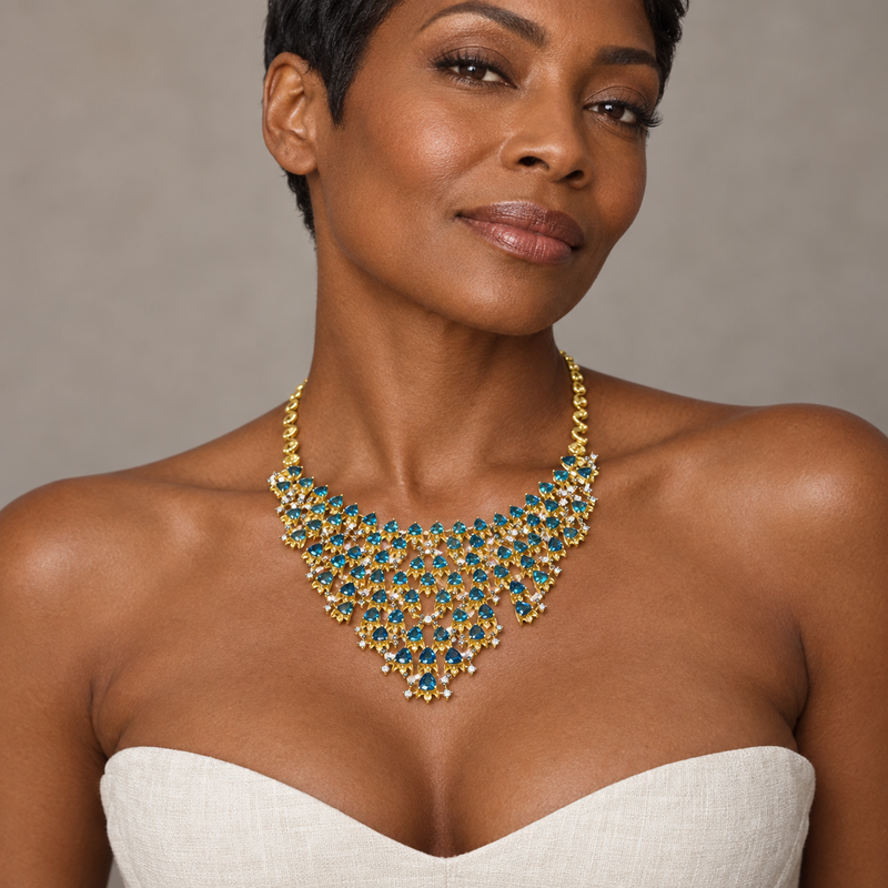 Model wearing the Lesunja Ocean Fish Topaz Yellow Gold Necklace