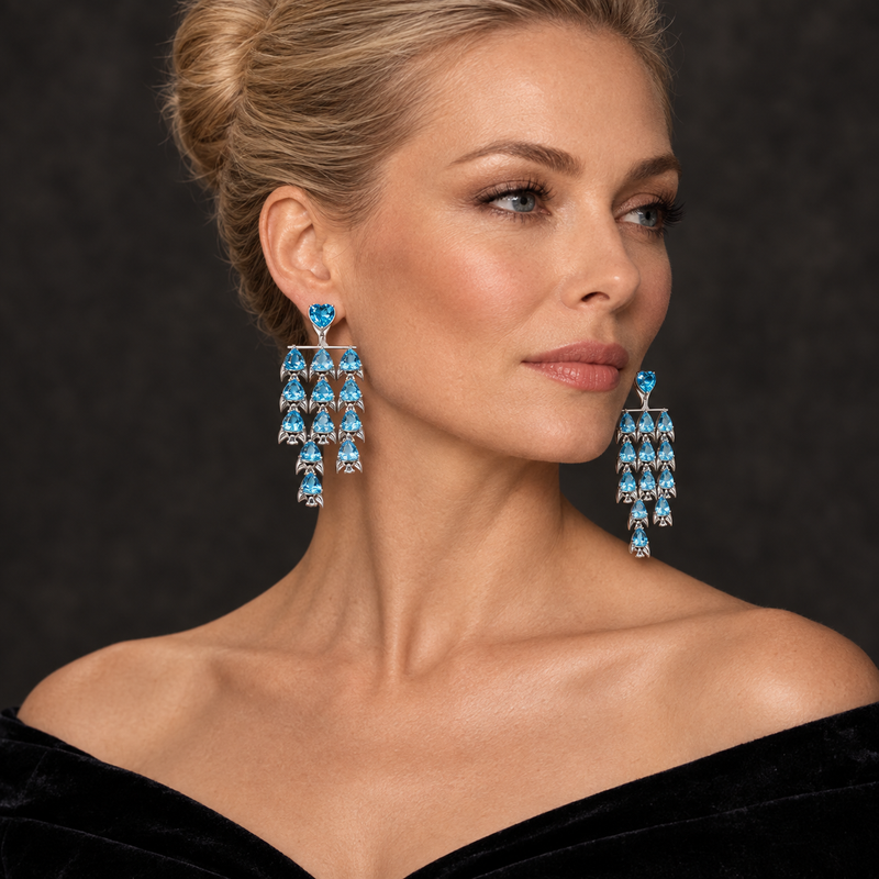 Model wearing the Lesunja Fish Ear Jewellery Topaz White Gold