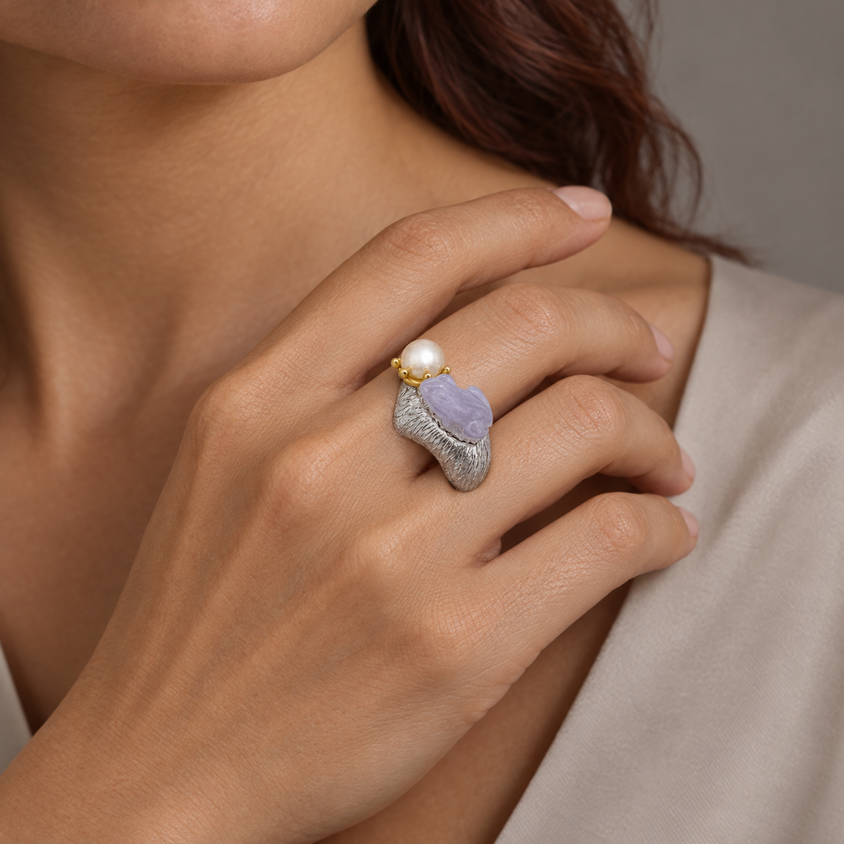 Model wearing the Lesunja Ring White Gold & Yellow Gold Jade Frog King Pearl