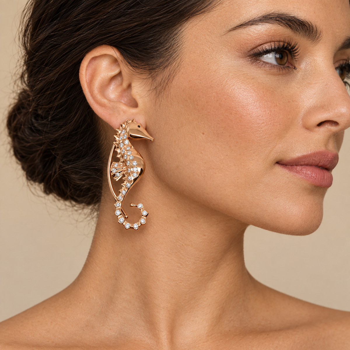 Model wearing the Lesunja Ocean Seahorses Rosé Gold Diamond Ear Hanger