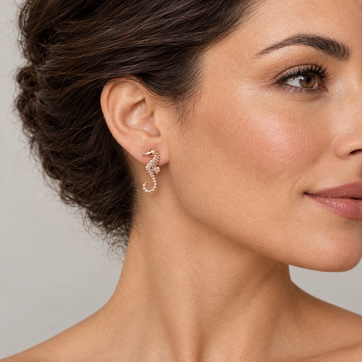 Model wearing the Lesunja Ocean Seahorses Diamond Rose Gold Ear Stud