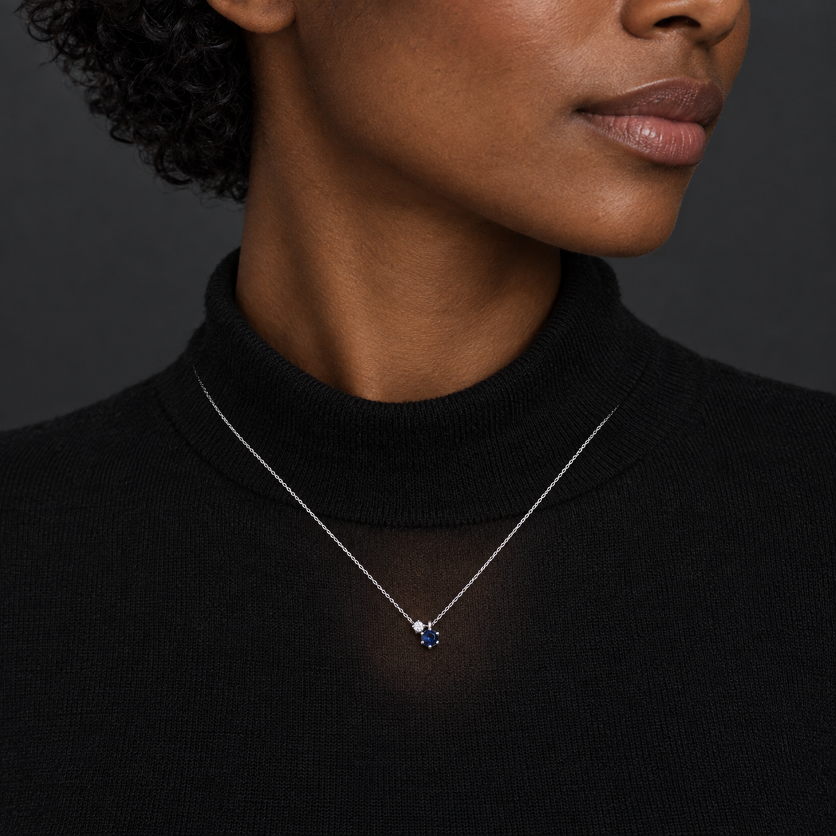 Model wearing the Lesunja White Gold Blue Sapphire Diamond Necklace