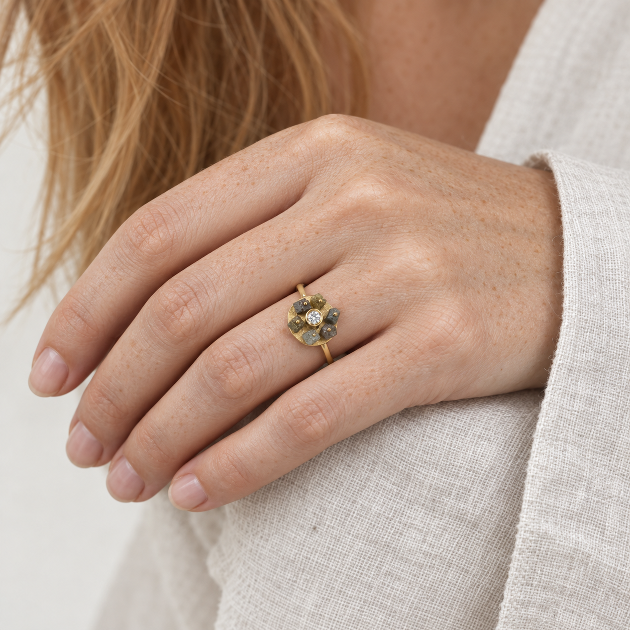 Model wearing the Lesunja Ring Yellow Gold 22K Rough Diamond Cubs