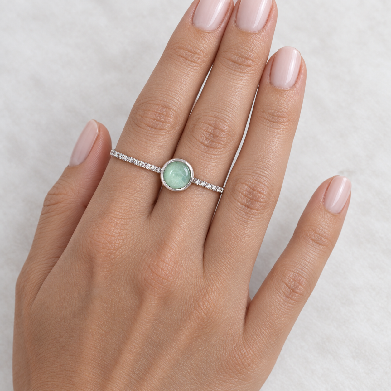 Model wearing the Lesunja Double Ring White Gold green Jade Bubble