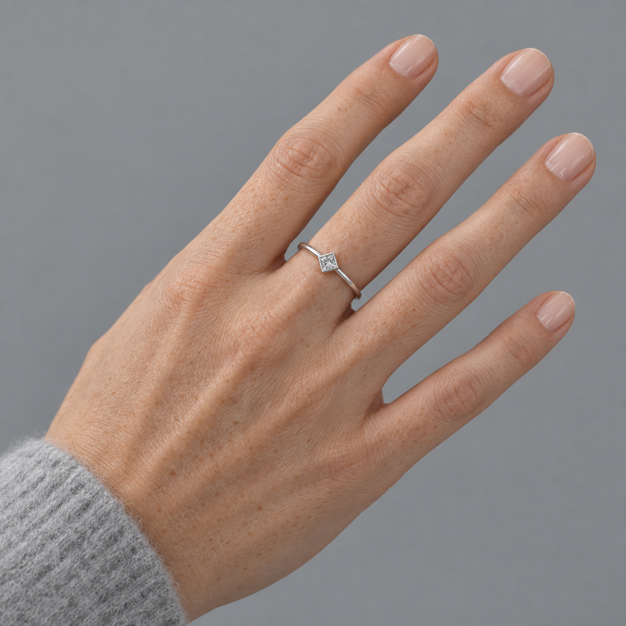 Model wearing the Lesunja Princess Cut Diamond White Gold Solitaire