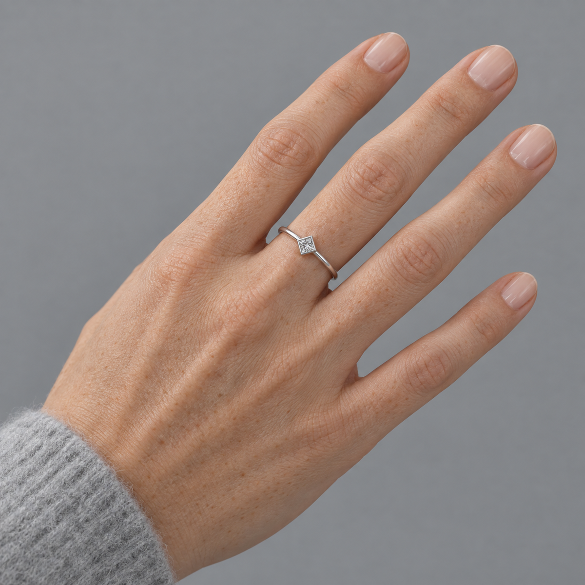 Model wearing the Lesunja Princess Cut Diamond White Gold Solitaire