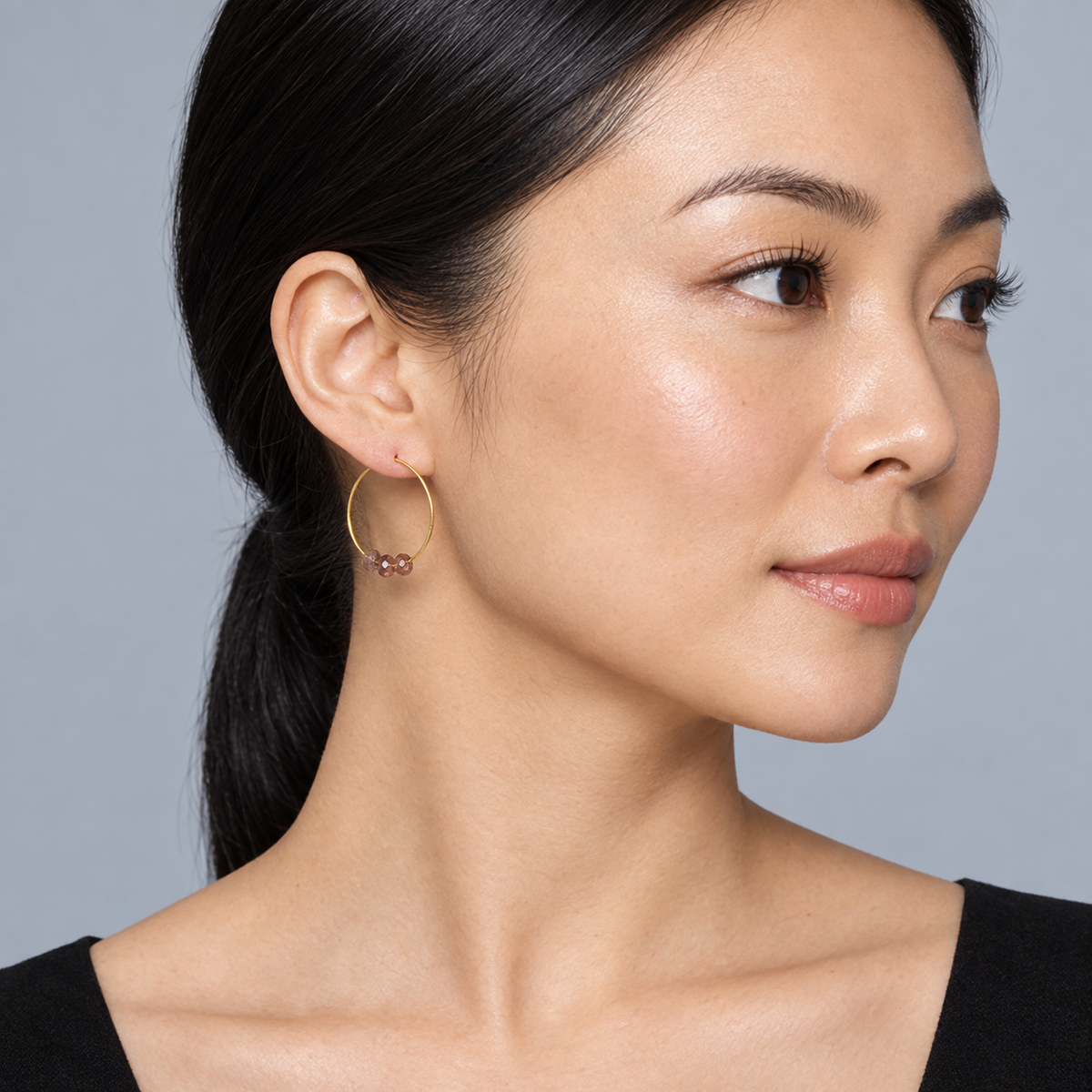Model wearing the Lesunja Yellow Gold Hoop Classic Brown Diamonds 03