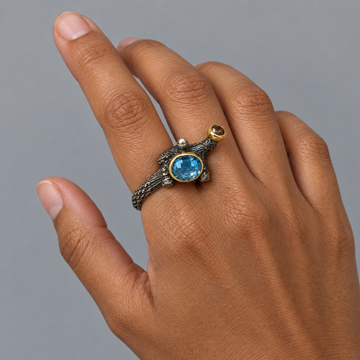 Model wearing the Lesunja Ocean XXY Boho Sepia Ring Silver Yellow Gold Topaz Diamond