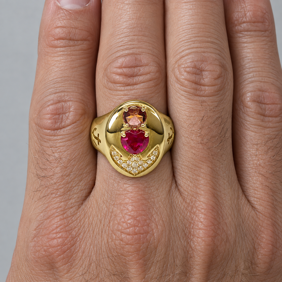 Model wearing the Lesunja Signet Ring Yellow Gold 9K Ruby Tourmaline Diamonds