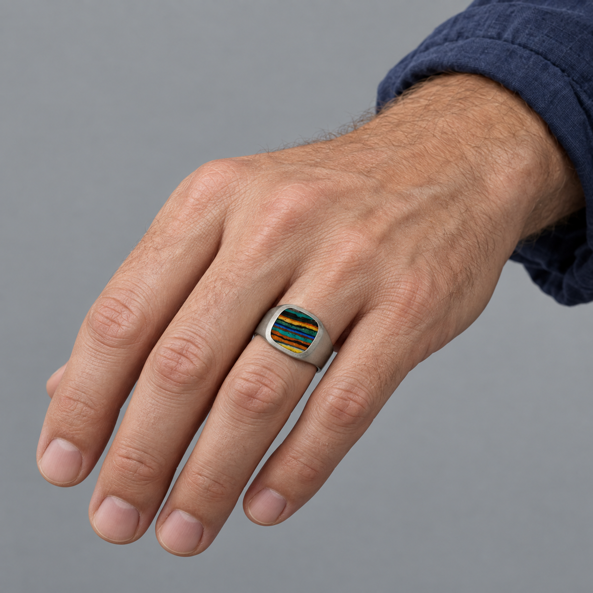 Model wearing the Lesunja Signet Ring Palladium With Rainbow Chrysocolla