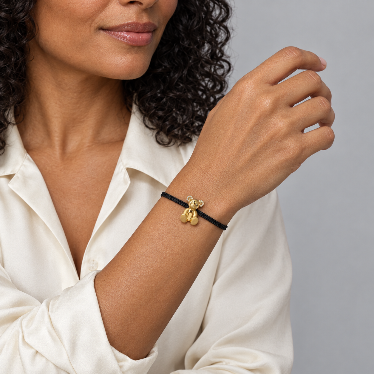 Model wearing the Lesunja Breuninger Bear Bracelet 18K Gold 18 x 0.08ct Diamonds