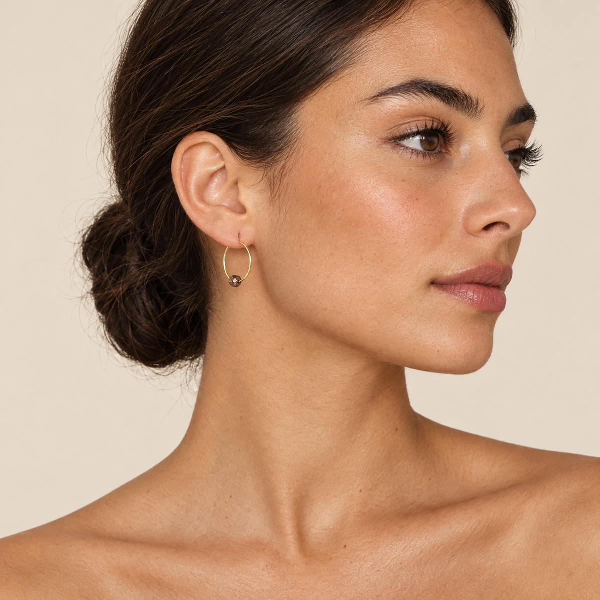 Model wearing the Lesunja Yellow Gold Hoop Classic Brown Diamonds 01