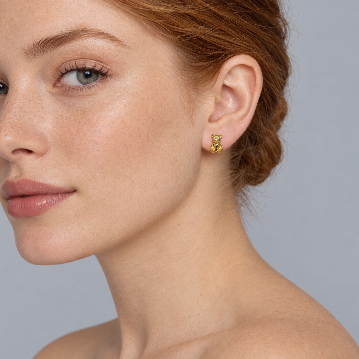 Model wearing the Lesunja Breuninger Bear Earrings 18K Gold 6 x 0.01ct Diamonds