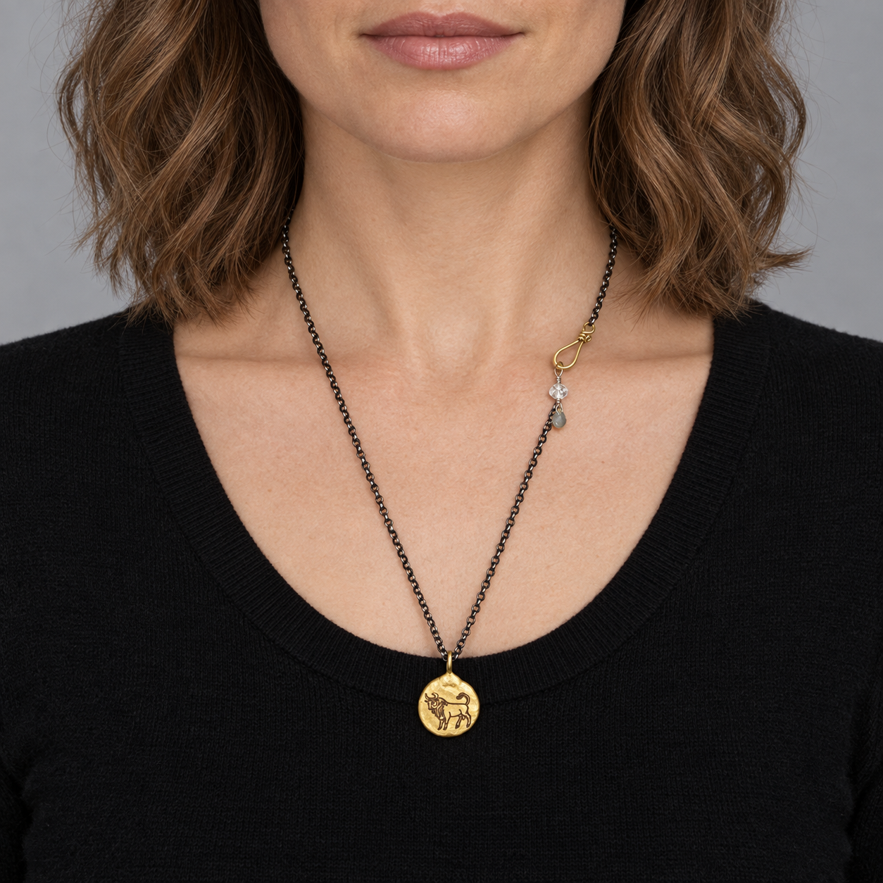 Model wearing the Lesunja Zodiac Taurus Silver Necklace Yellow Gold Nugget Moonstone