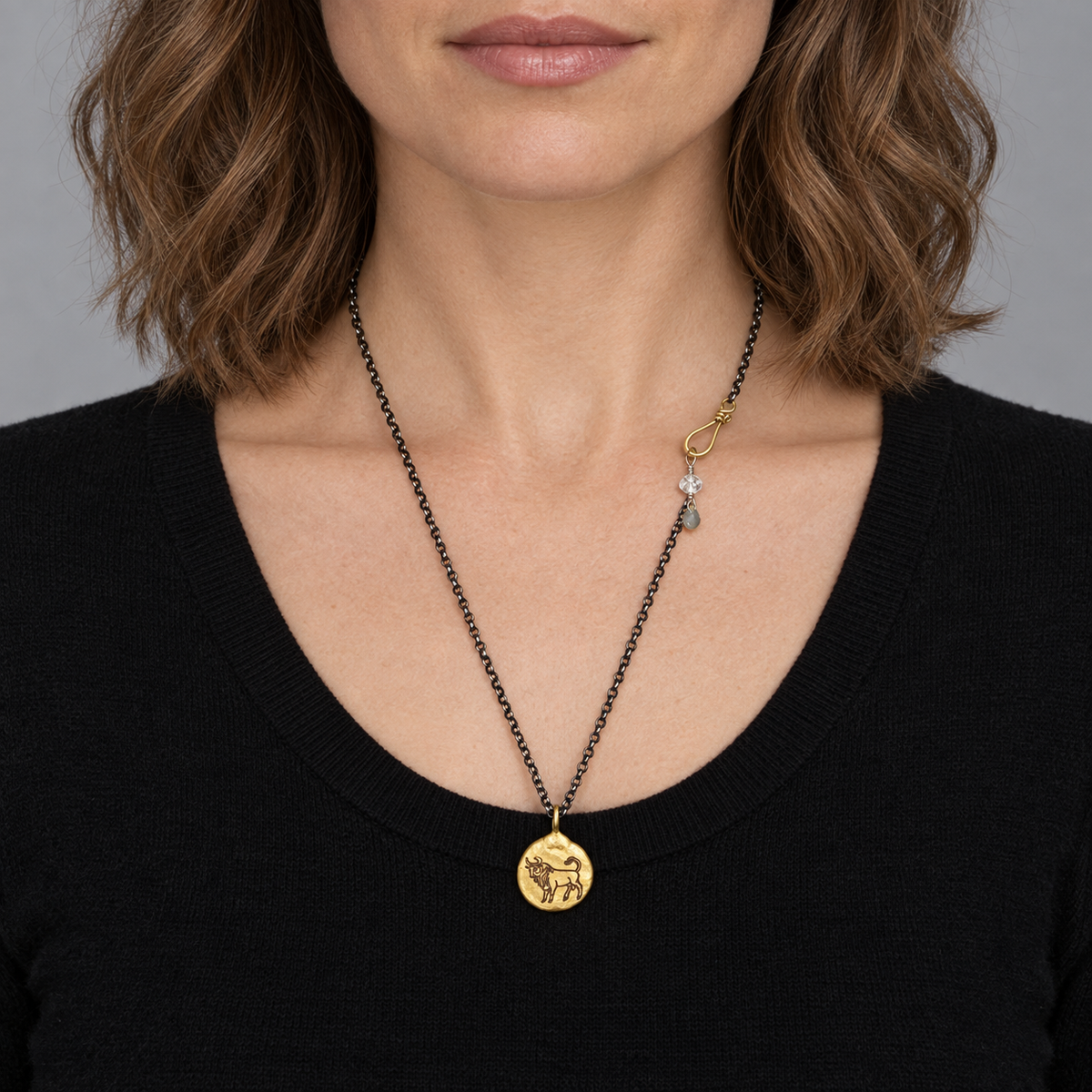 Model wearing the Lesunja Zodiac Taurus Silver Necklace Yellow Gold Nugget Moonstone