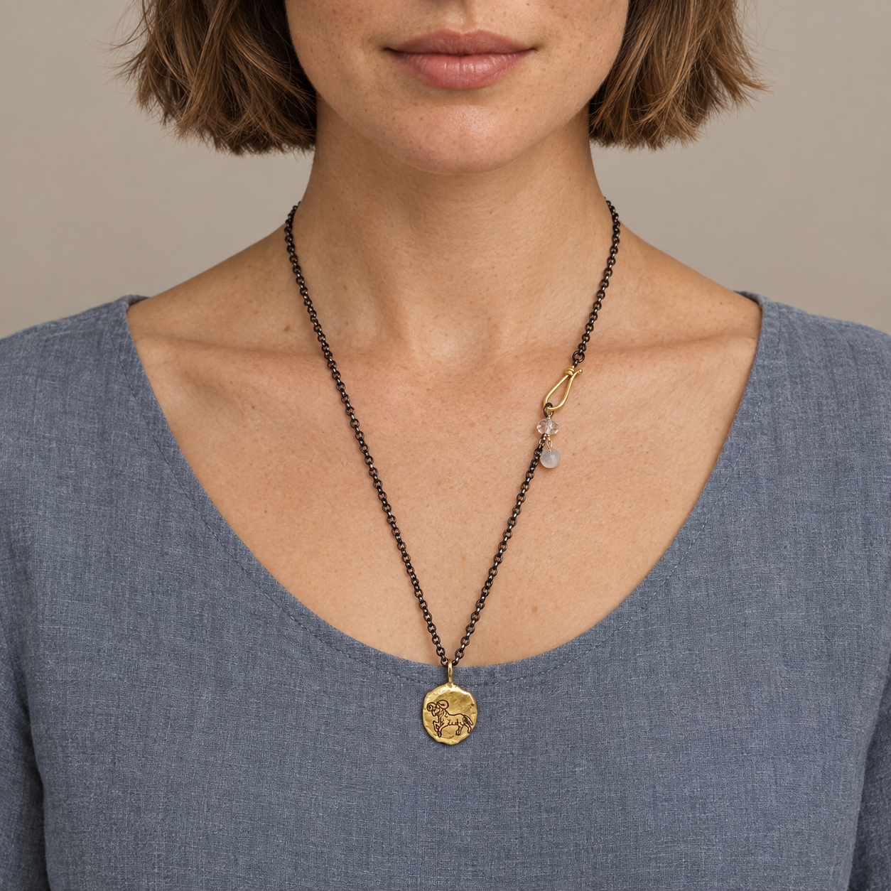 Model wearing the Lesunja Zodiac Aries Yellow Silver Chain Gold Nugget Moonstone