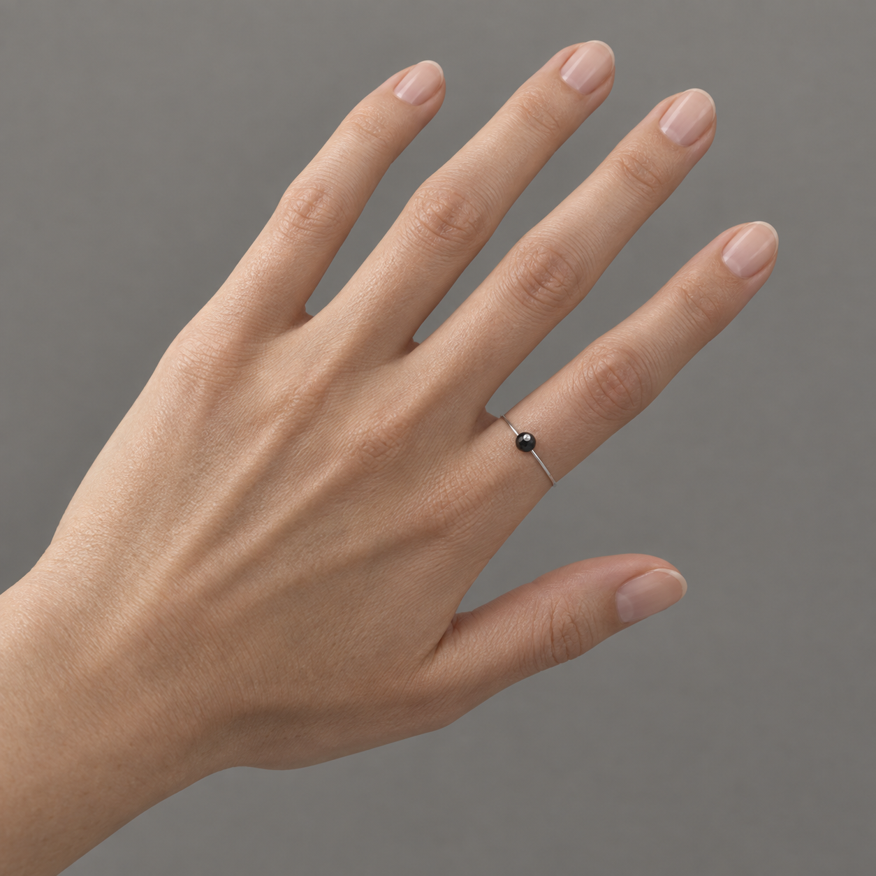 Model wearing the Lesunja Je Veux Black Diamond White Gold Ring