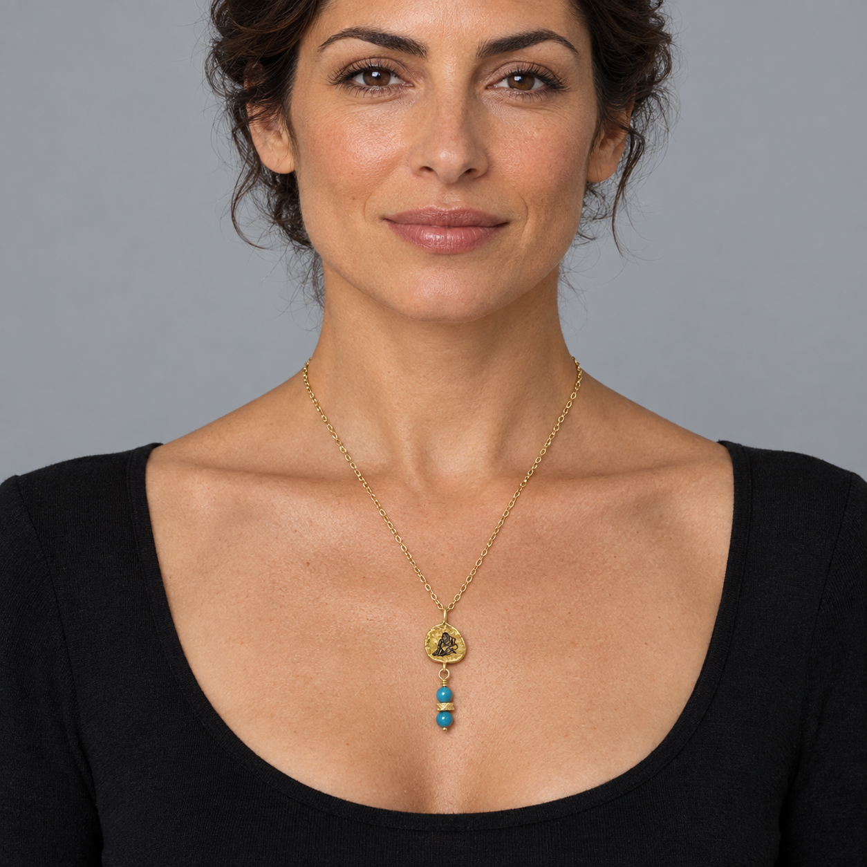 Model wearing the Lesunja Zodiac Aquarius Gold Necklace