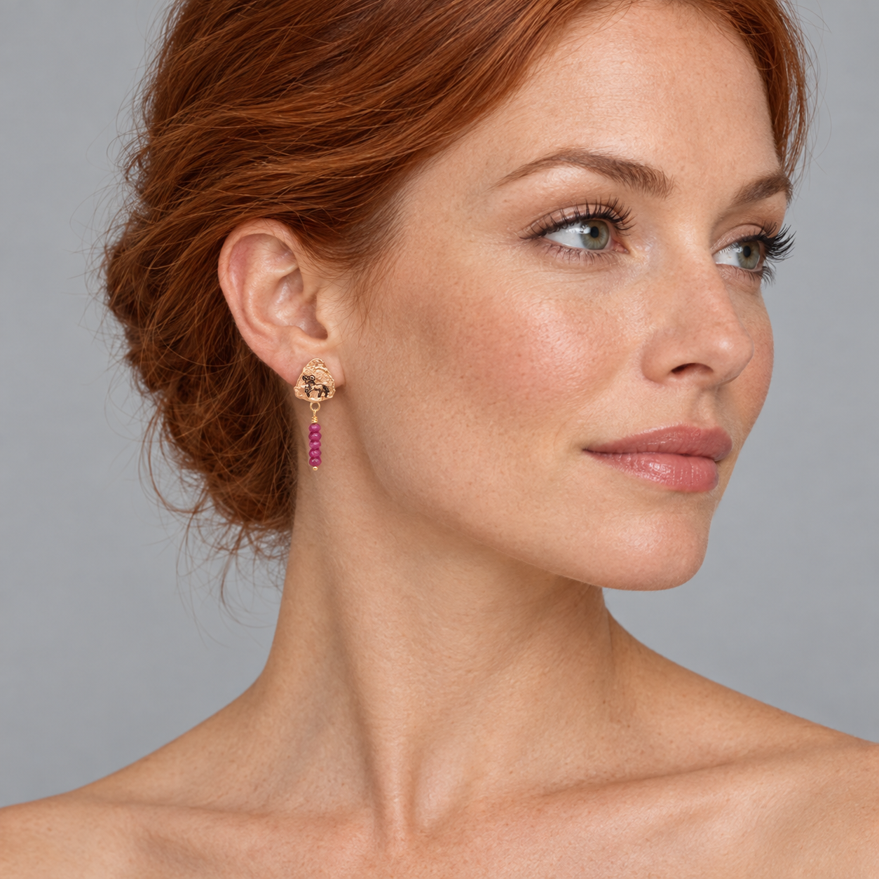 Model wearing the Lesunja Zodiac Aries Gold Stud Earrings